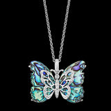 Social Butterfly Pendant in Sterling Silver and Aurora Borealis Blue Carved Mother of Pearl with Diamonds
